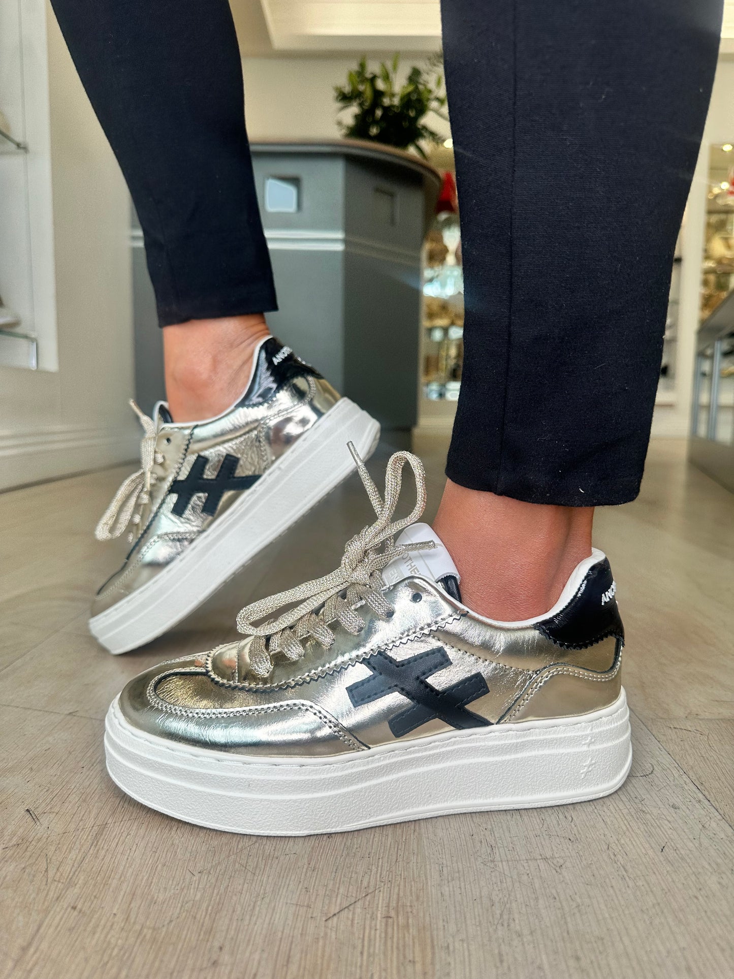 Another Trend -Metallic Gold Leather / Black Trim & White Platform Sole Trainer