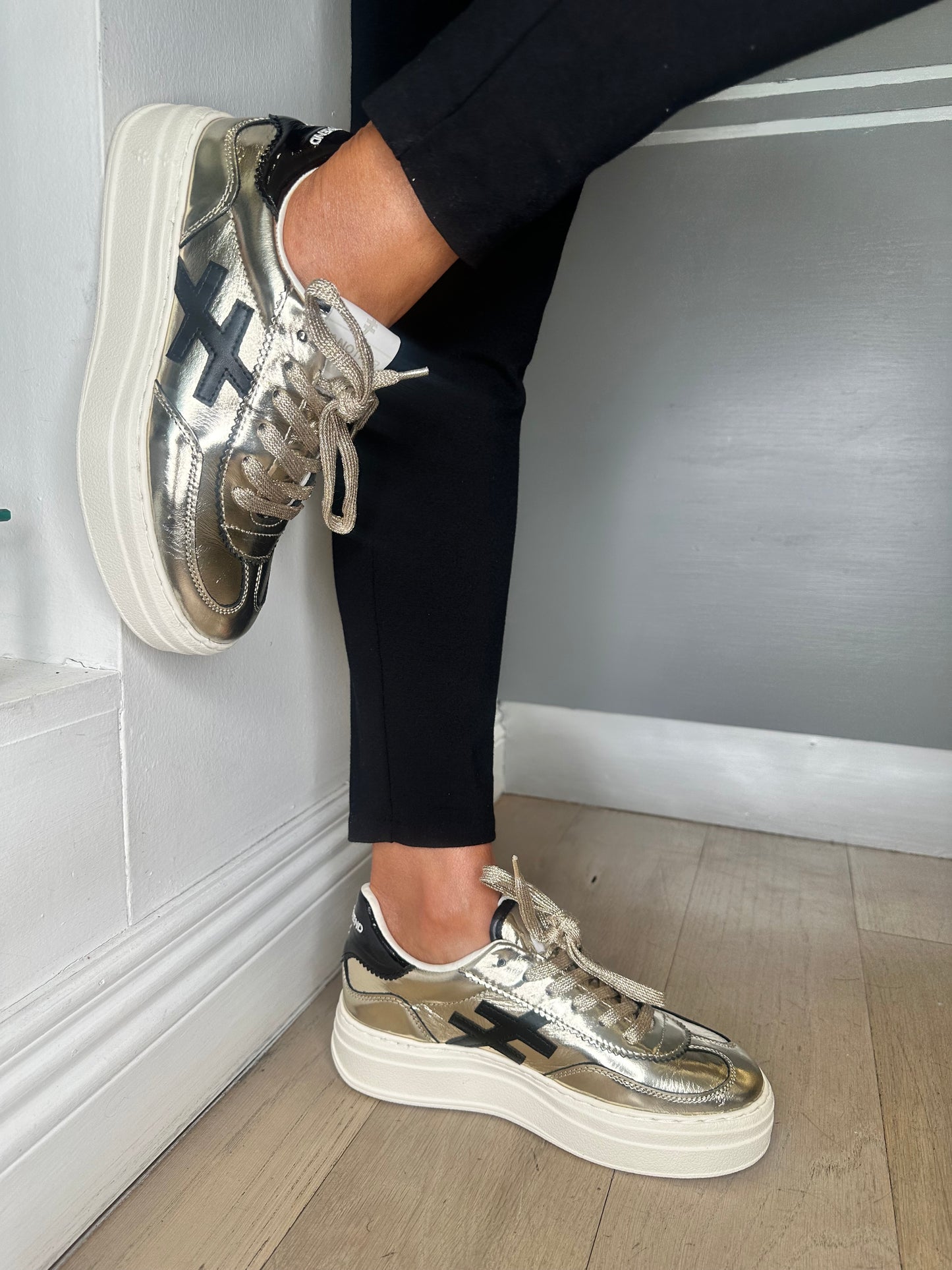Another Trend -Metallic Gold Leather / Black Trim & White Platform Sole Trainer