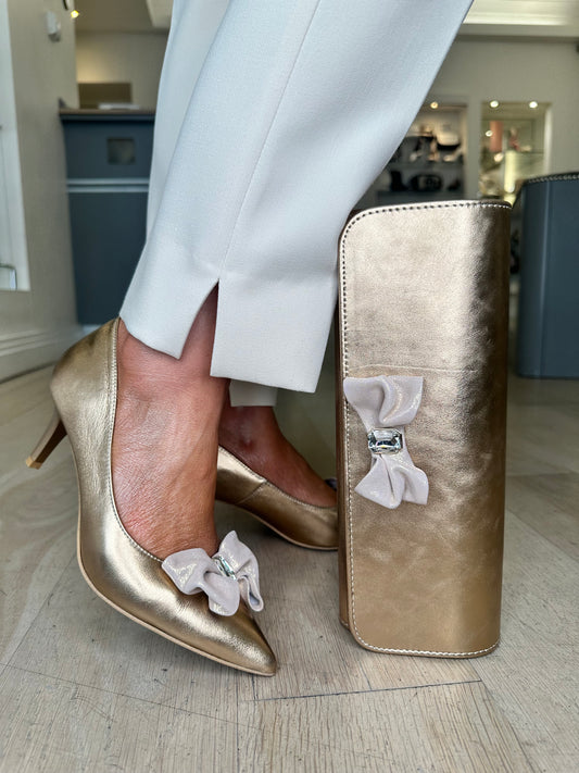 Emis - Matching Soft Bronze Metallic Clutch Bag With Bow Trim
