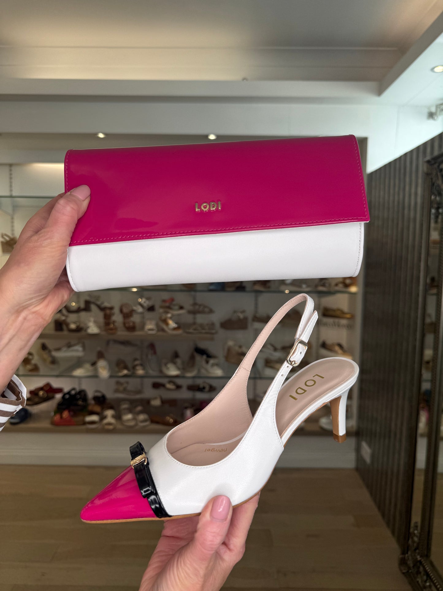 Lodi -White Leather & Hot Pink Pointy Toe Sling Back Court Shoe With Black Bow Trim