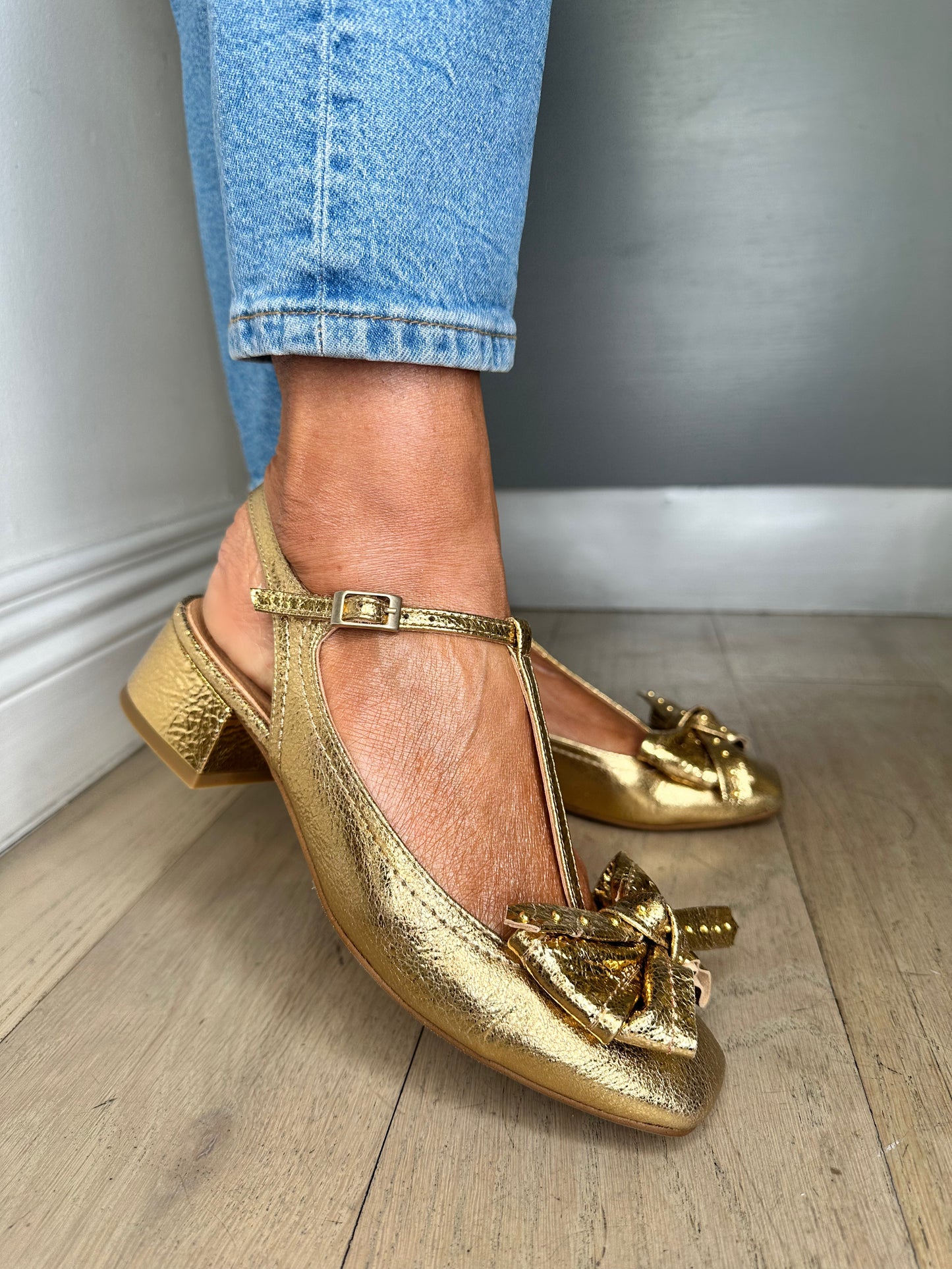 Marian - Antique Gold T-Bar Pomp Style Shoe With Bow Trim