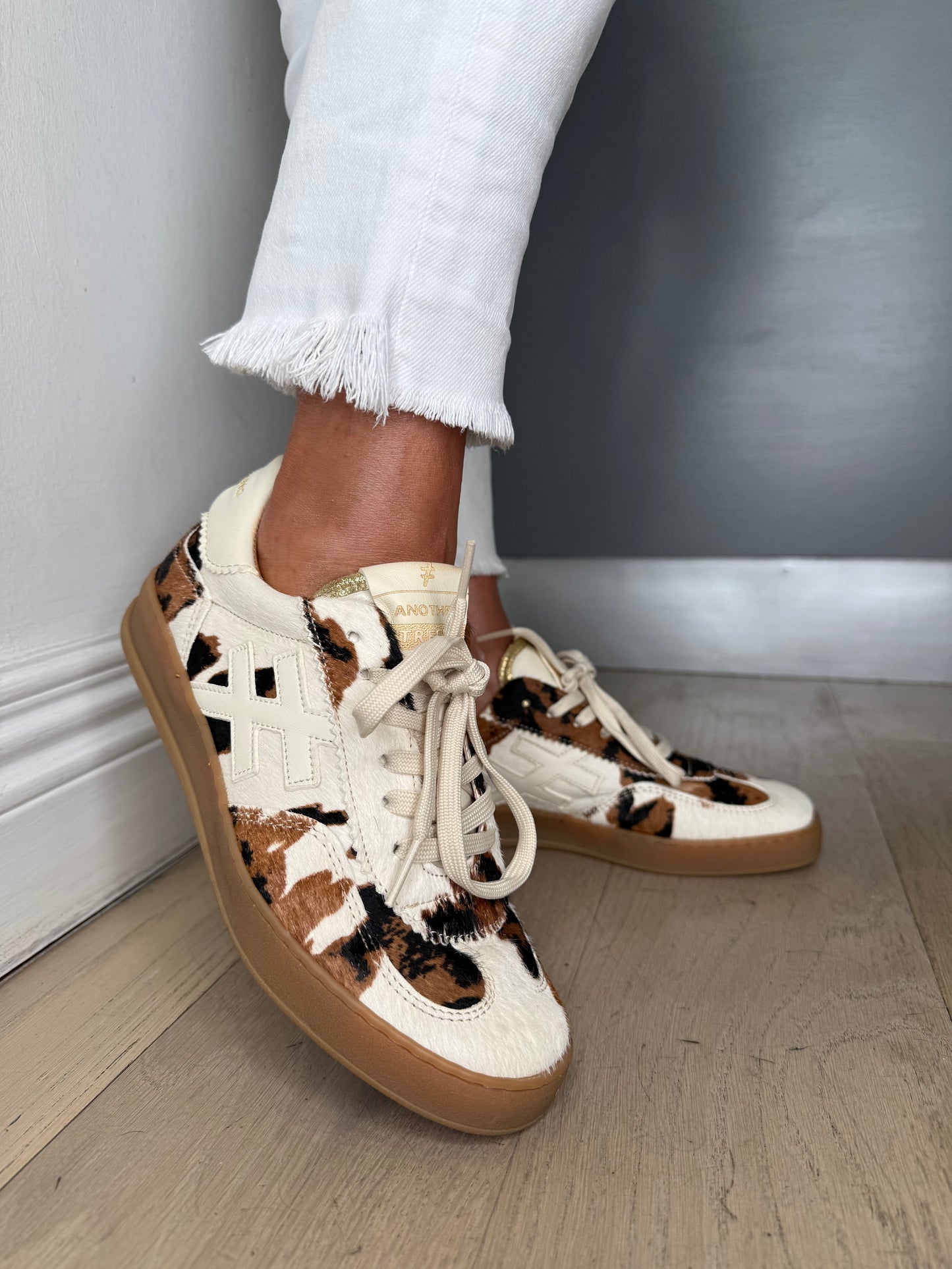 Another Trend - Rich Cream / Cowhide Print Trainer