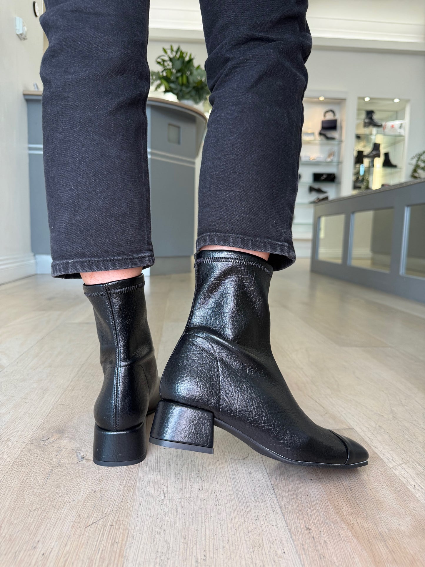 Miss Elastic - Black Stretch Leather Sock Boot With Medium Heel